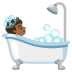 🛀🏾 person taking bath: medium-dark skin tone display on Google